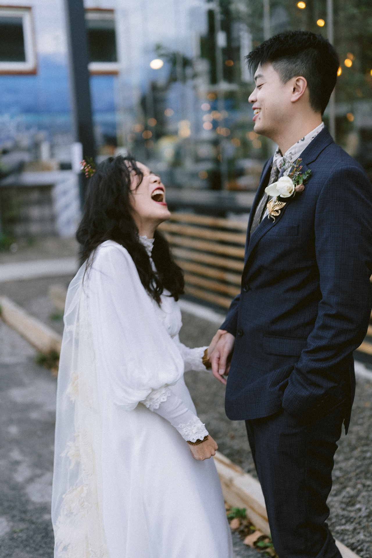 A couple in wedding attire sharing an intimate moment