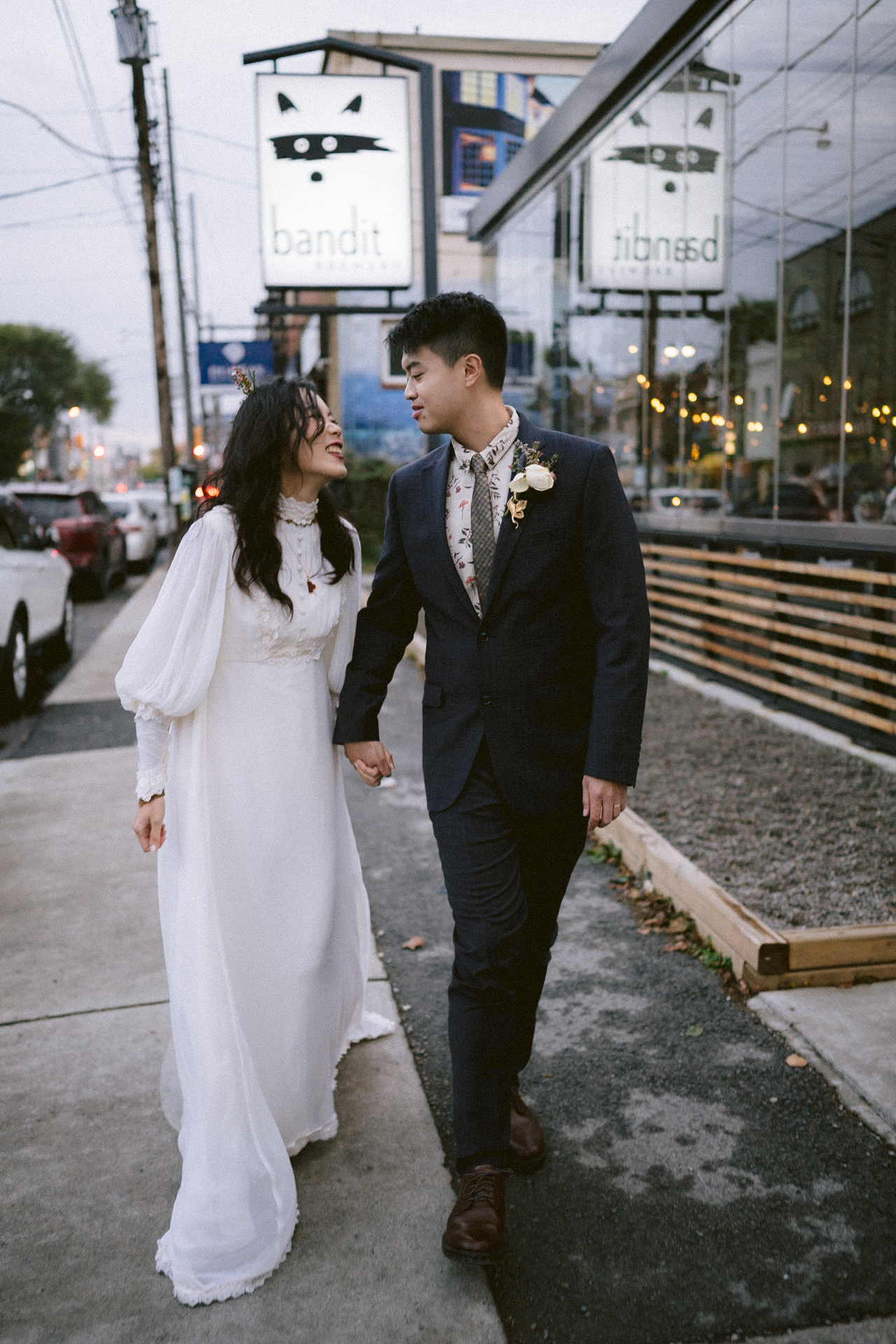 A couple in wedding attire sharing an intimate moment