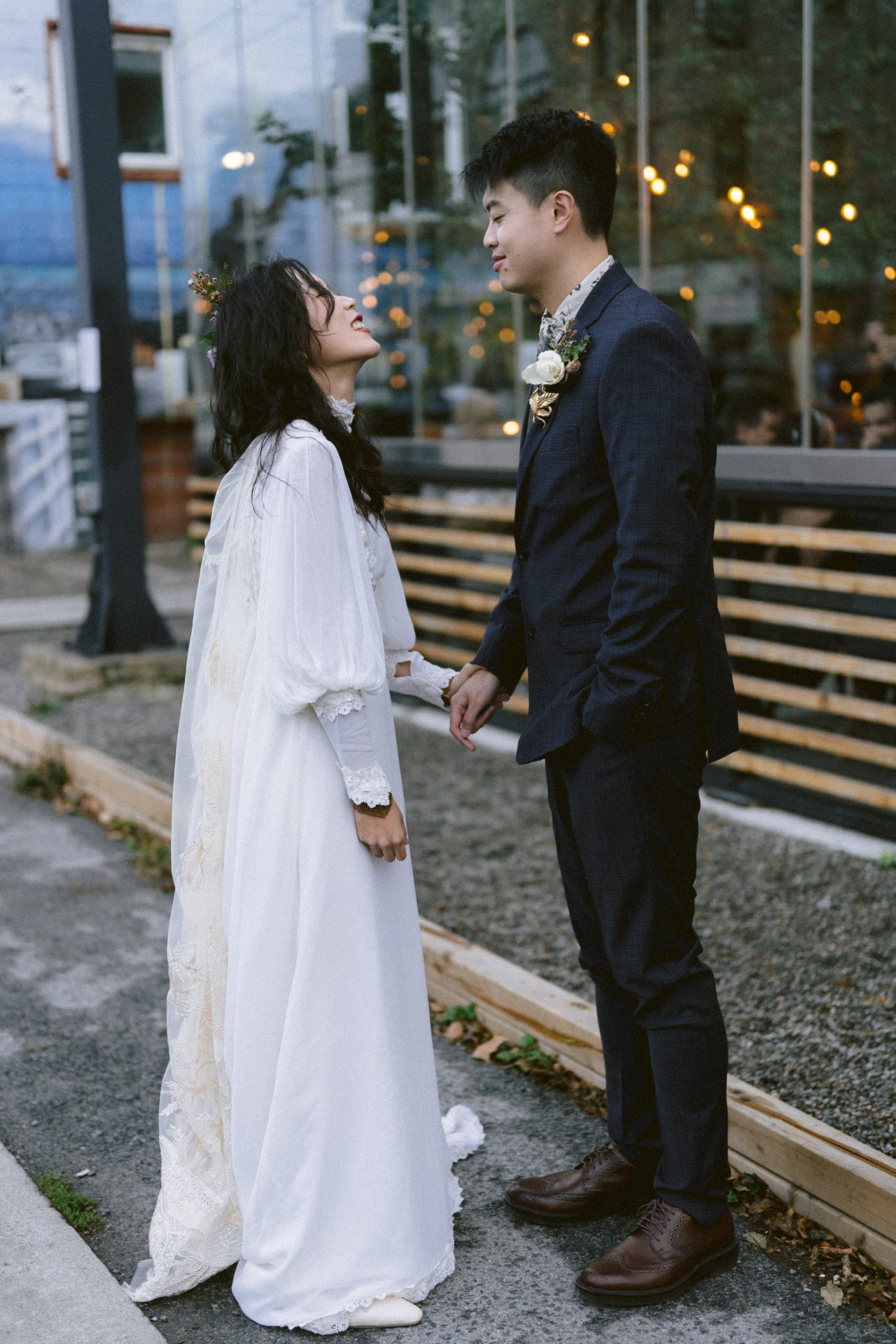 A couple in wedding attire sharing an intimate moment