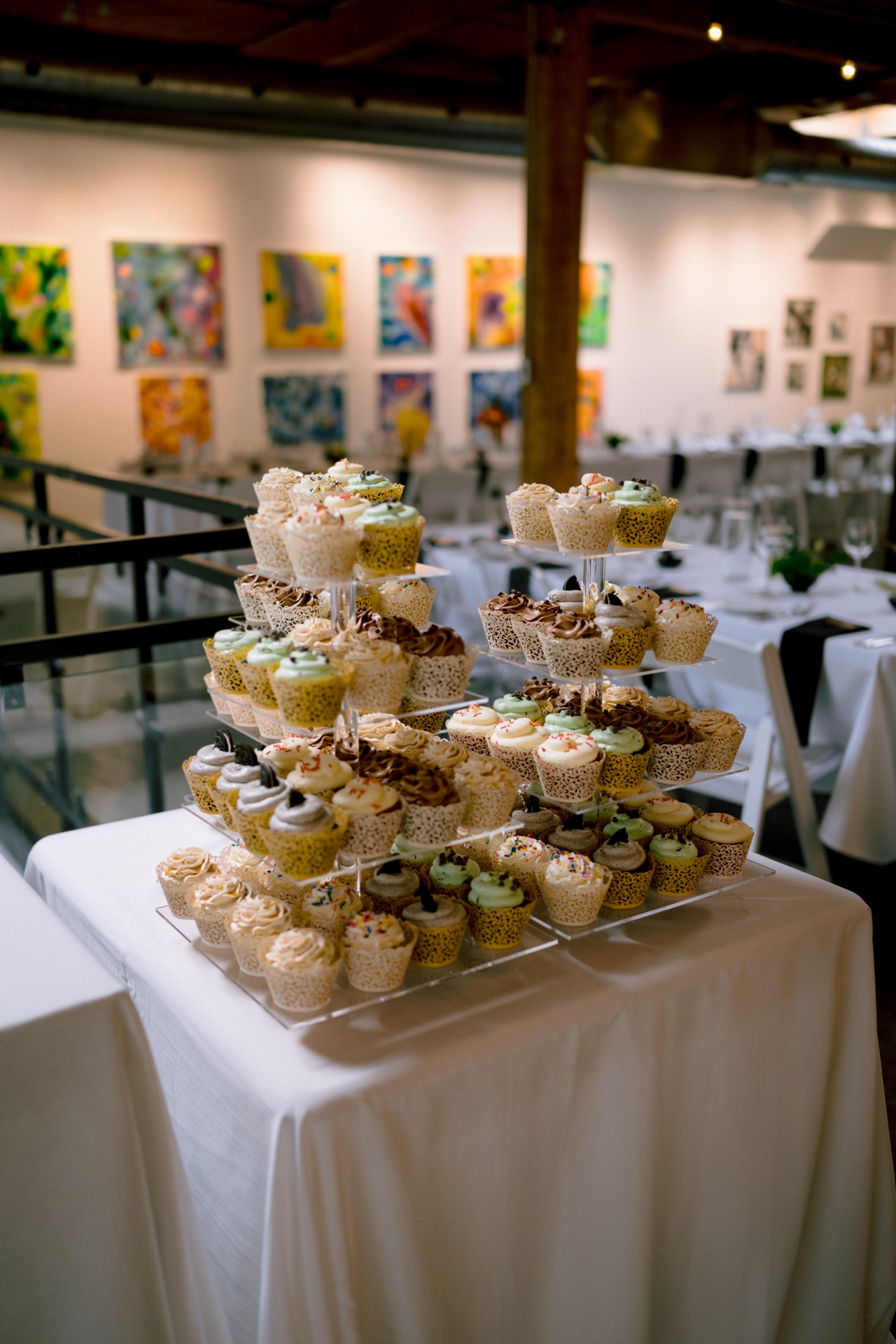 Wedding cake displayed on a table at Twist Gallery.