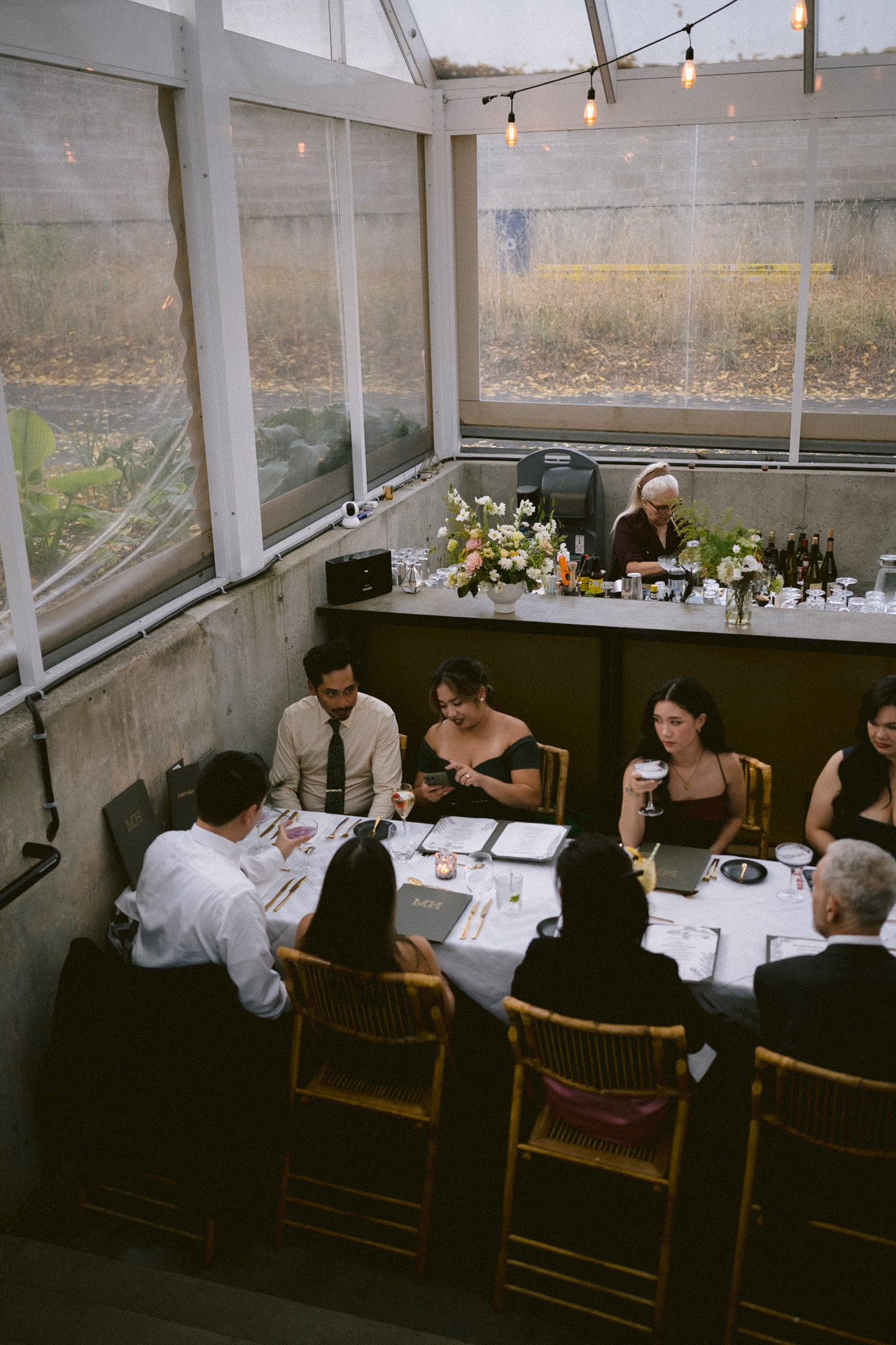 Wedding guests enjoying the reception.