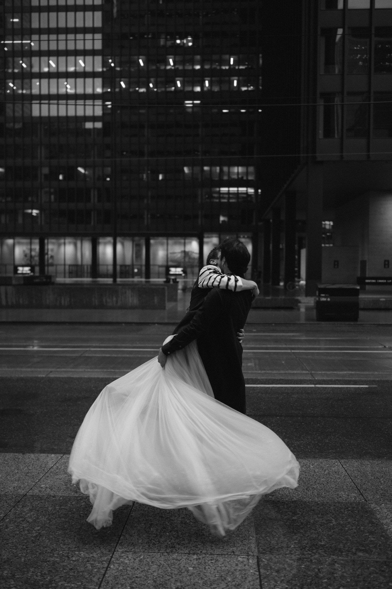 Gay couple sharing a kiss in Toronto.