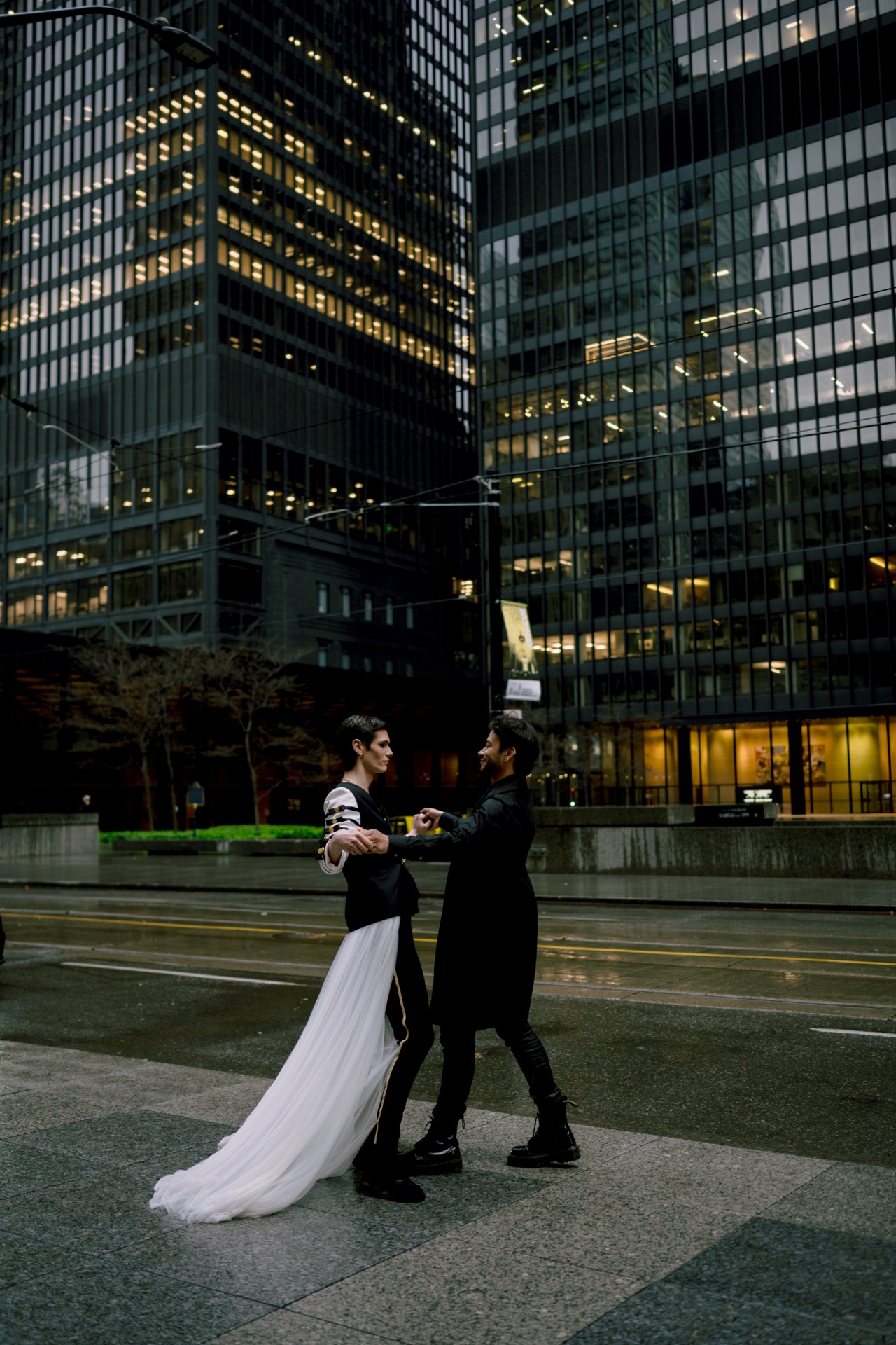 LGBTQ couple's romantic rainy photos.