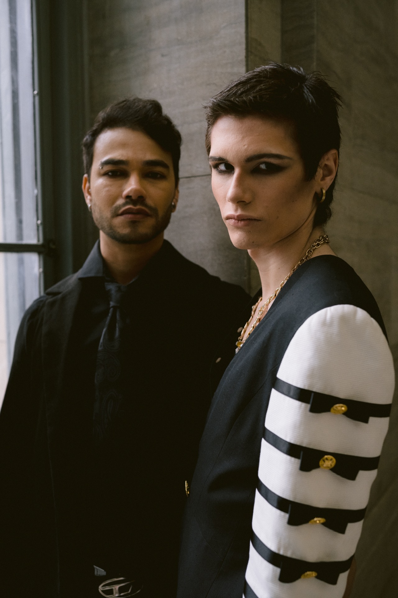 Gay couple posing at Union Station for their wedding portrait.