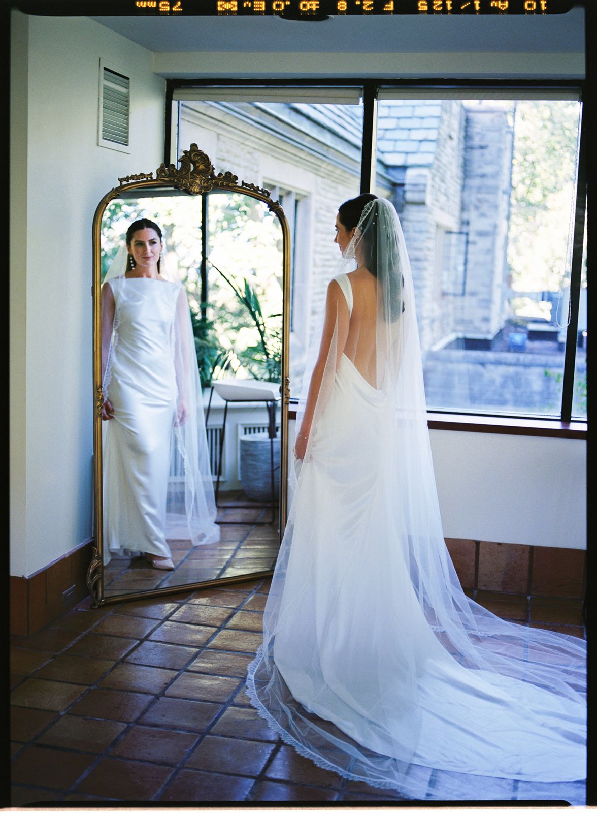 Bride getting ready at a bridal suits at The Estates of Sunnybrook
