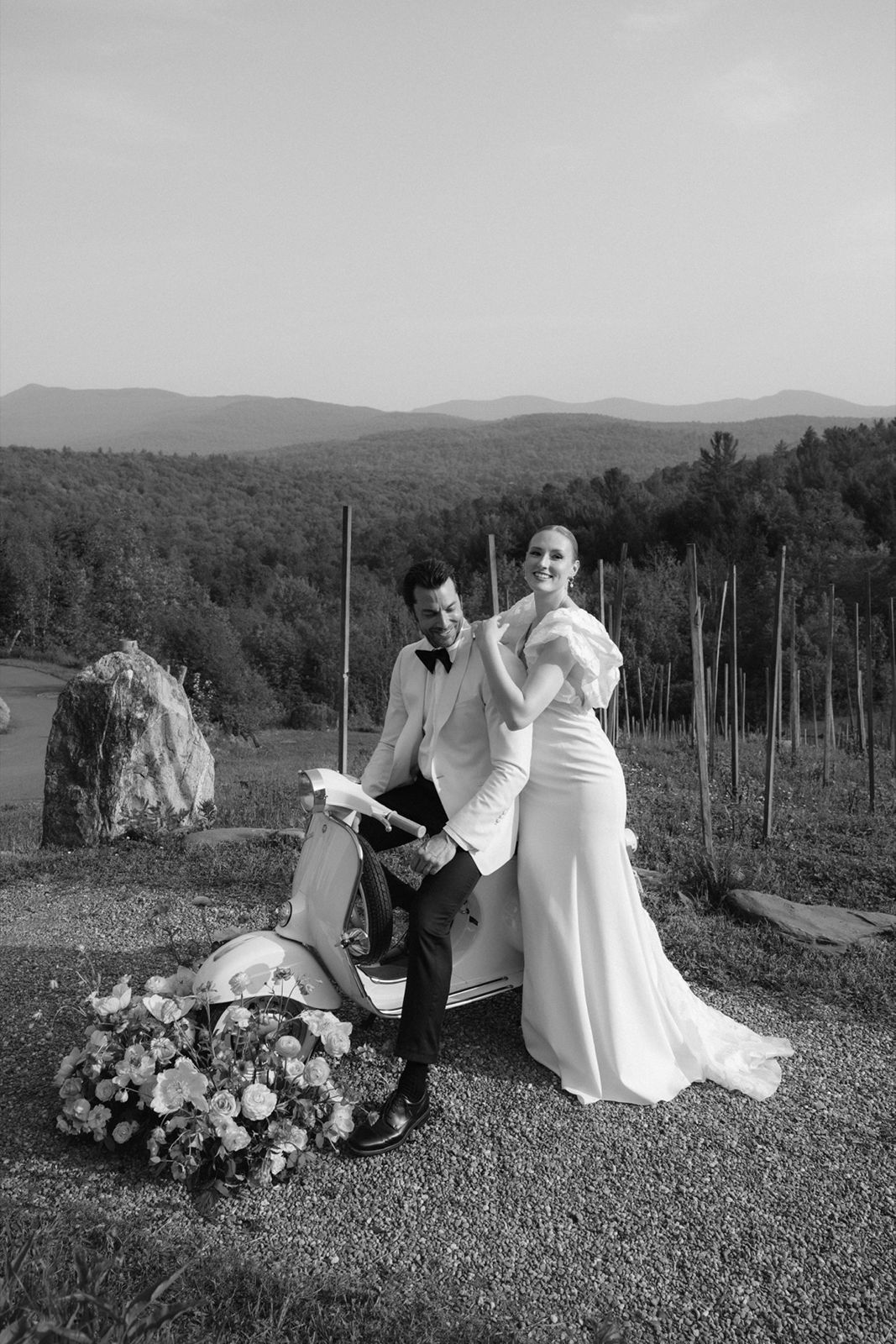 Bride holding the groom shoulder during the sunset couple portrait