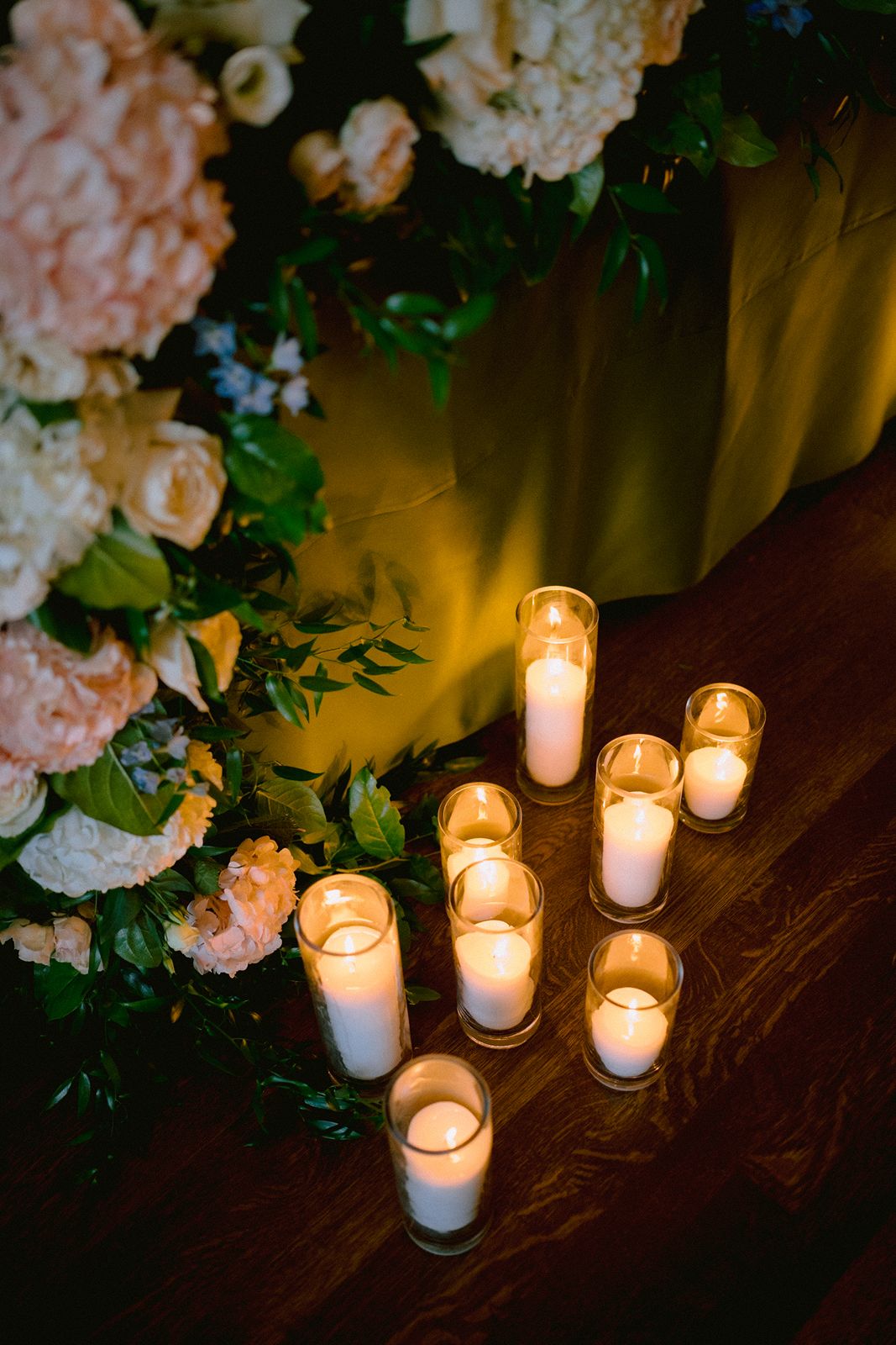 Warm candlelit wedding reception at University Club of Toronto.