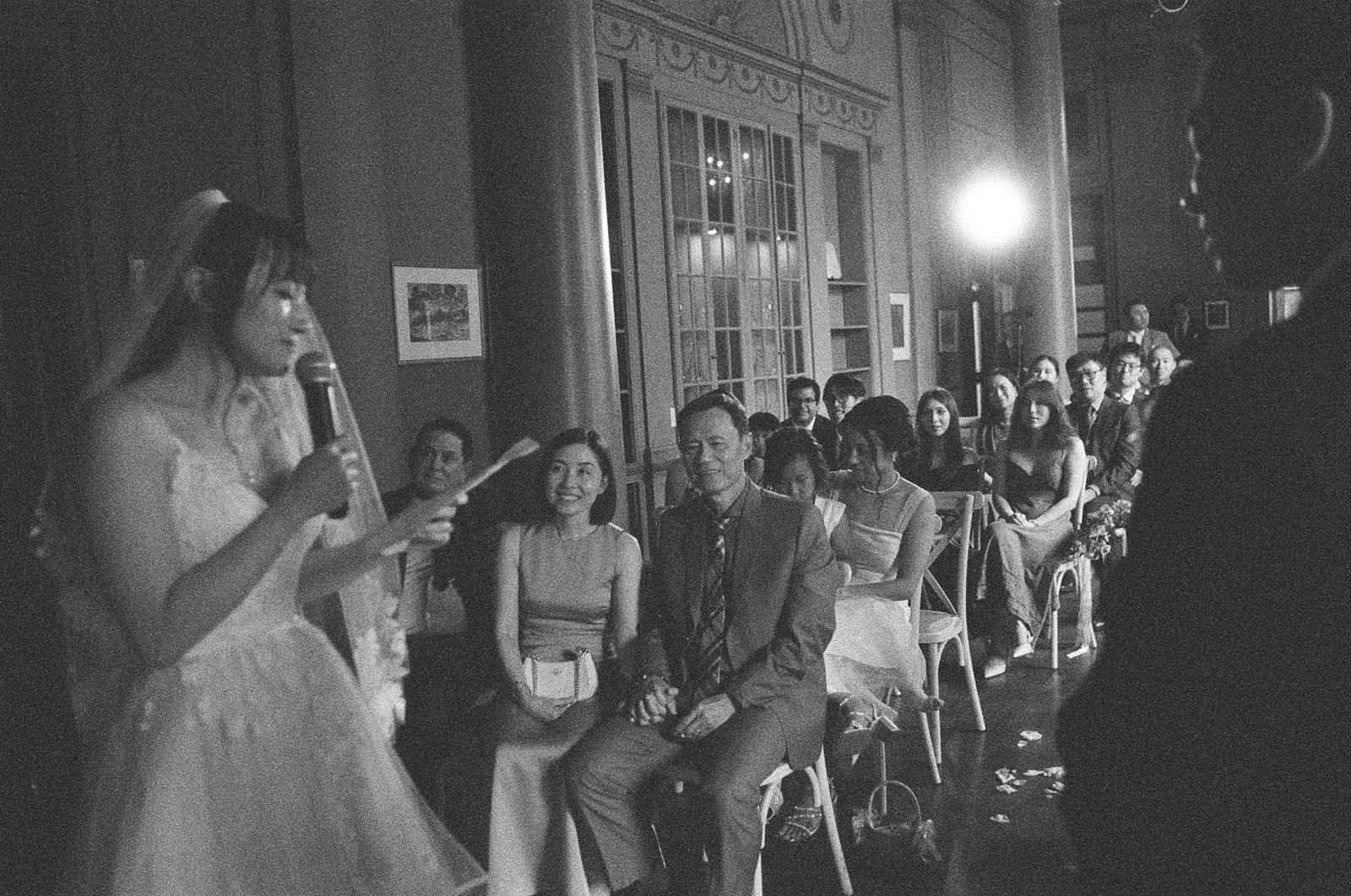 Wide shot of an intimate Toronto wedding ceremony with historic charm.