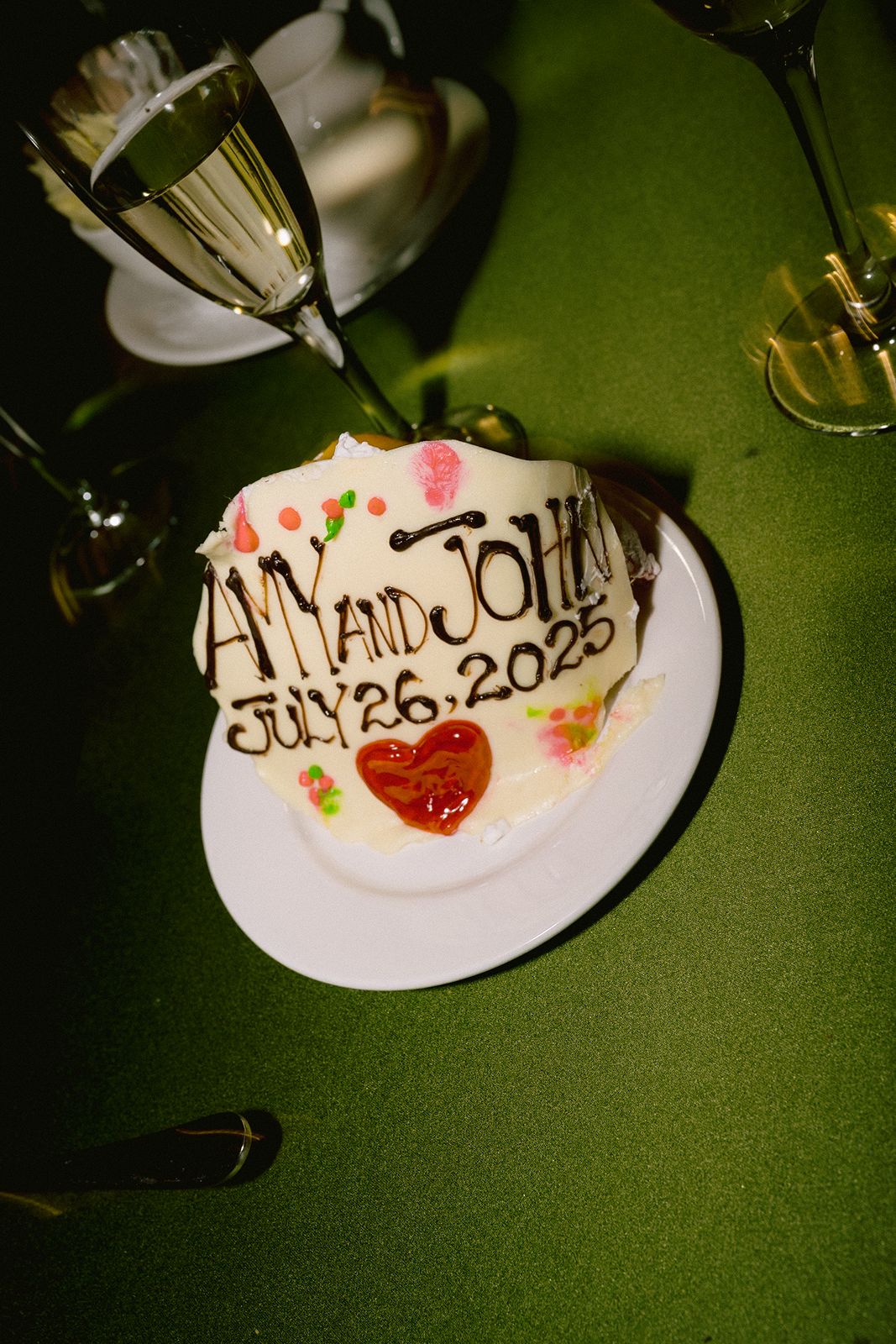 Detail shot of wedding cake on a vintage surface.