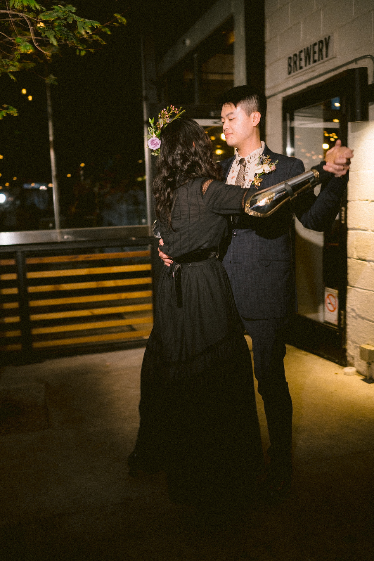 The newlyweds dance romantically at their micro-wedding in Toronto.