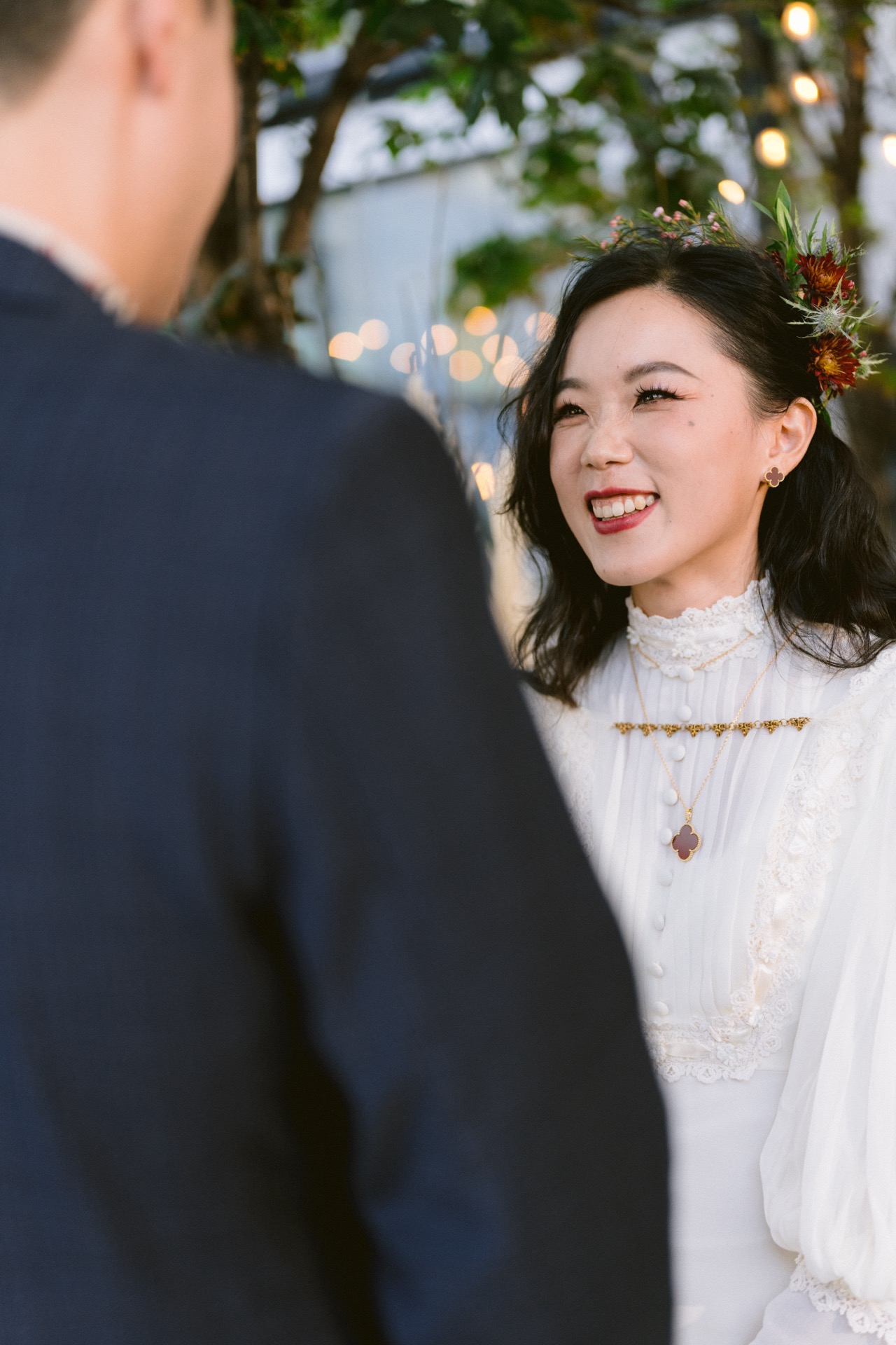 Bride saying "Yes, I do" in front of guests at a micro-wedding.