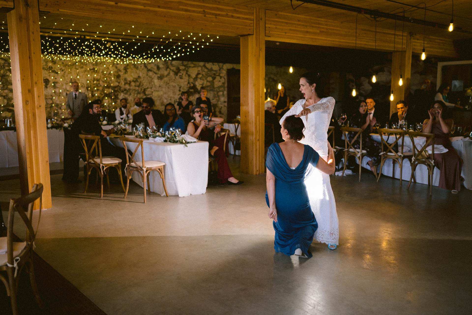 Bride and her mother performed the parent dance to the guests in a wedding at Cambium Farms.