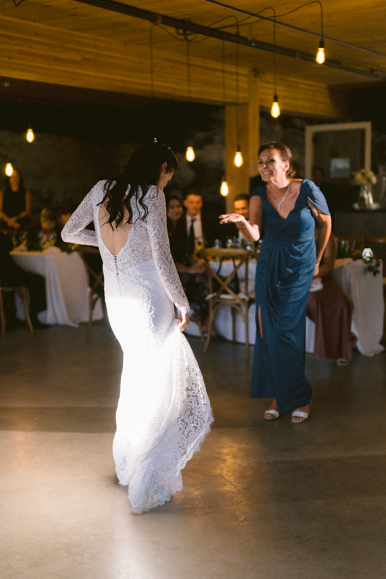 Bride dance with her mother at a wedding at Cambium Farms when Toronto wedding photographer take that moment for them.