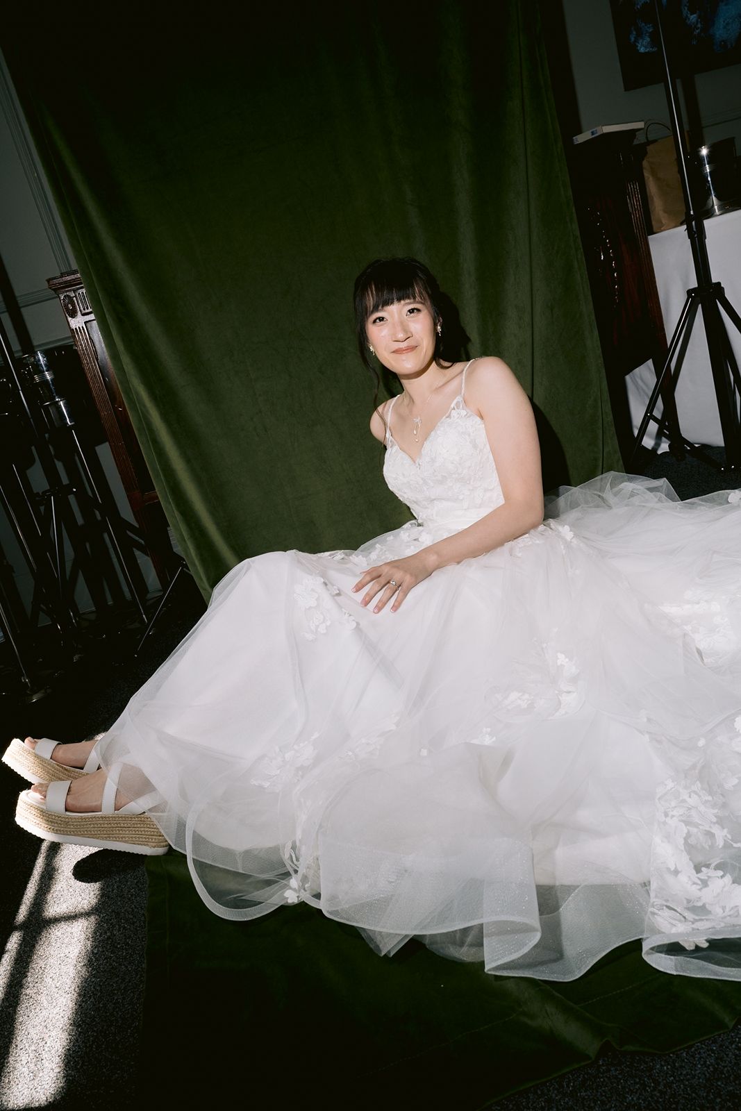 Bride portrait in front of a backdrop 