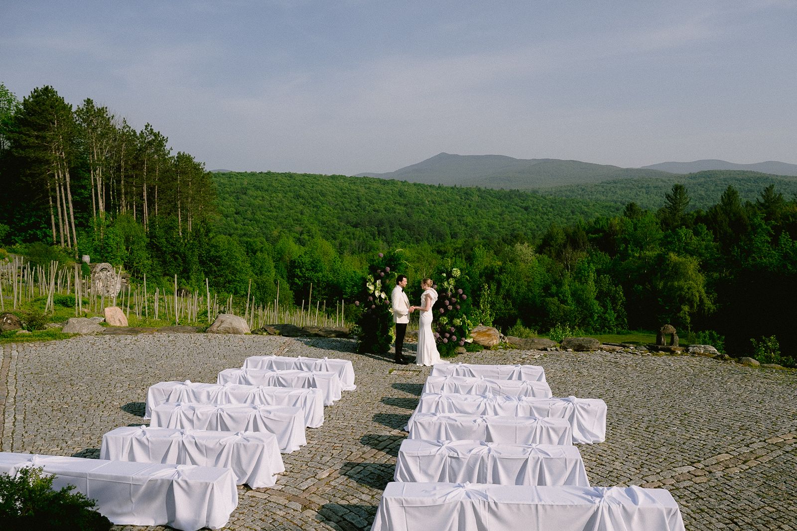 Bride and groom exchange vows at Chateau Ste Agnes