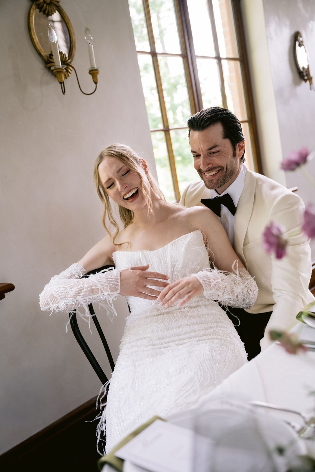 Bride and groom enjoy cocktail at their Chateau Ste Agnes wedding