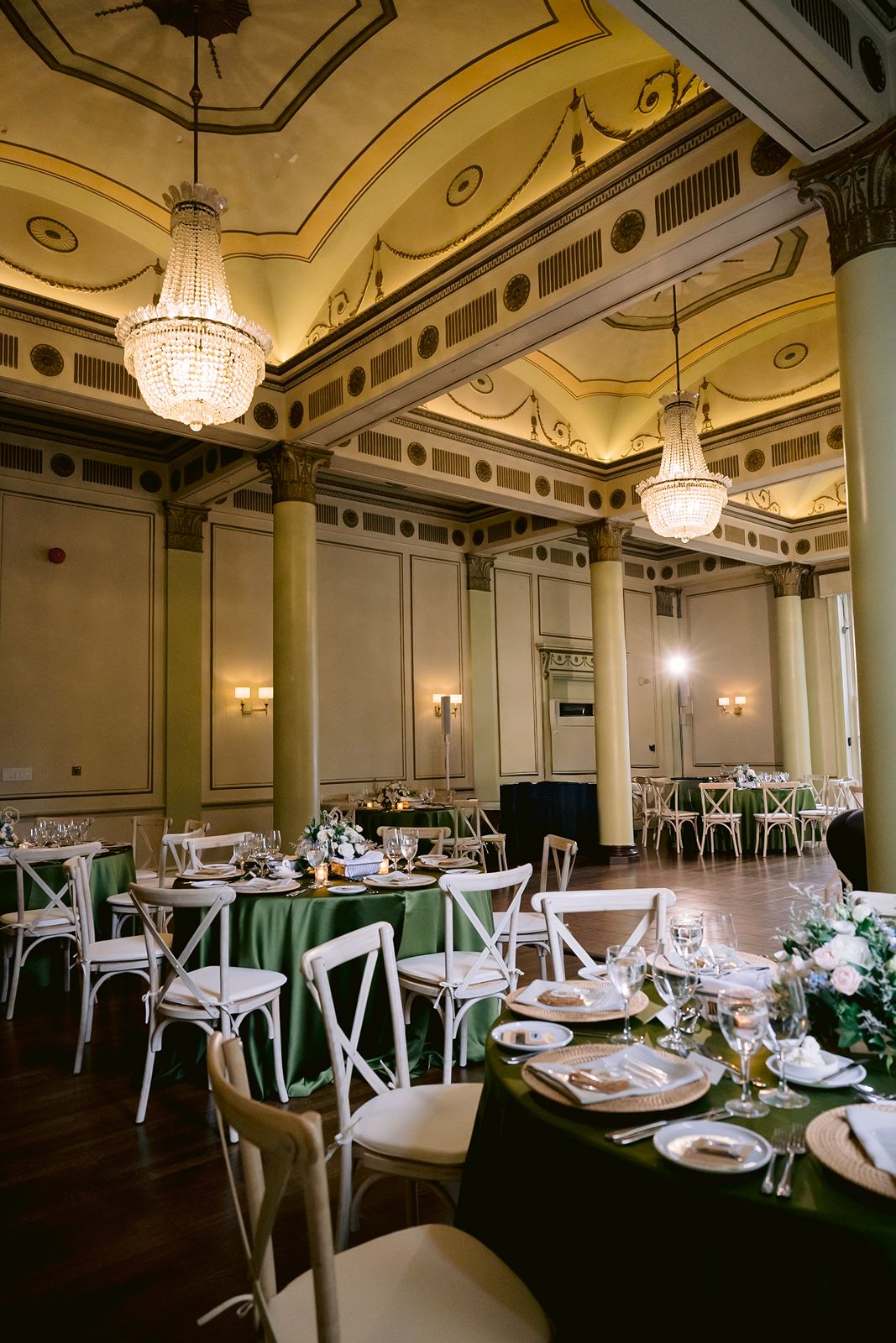 Tall floral centerpieces by Designs by Dina at a Toronto wedding.