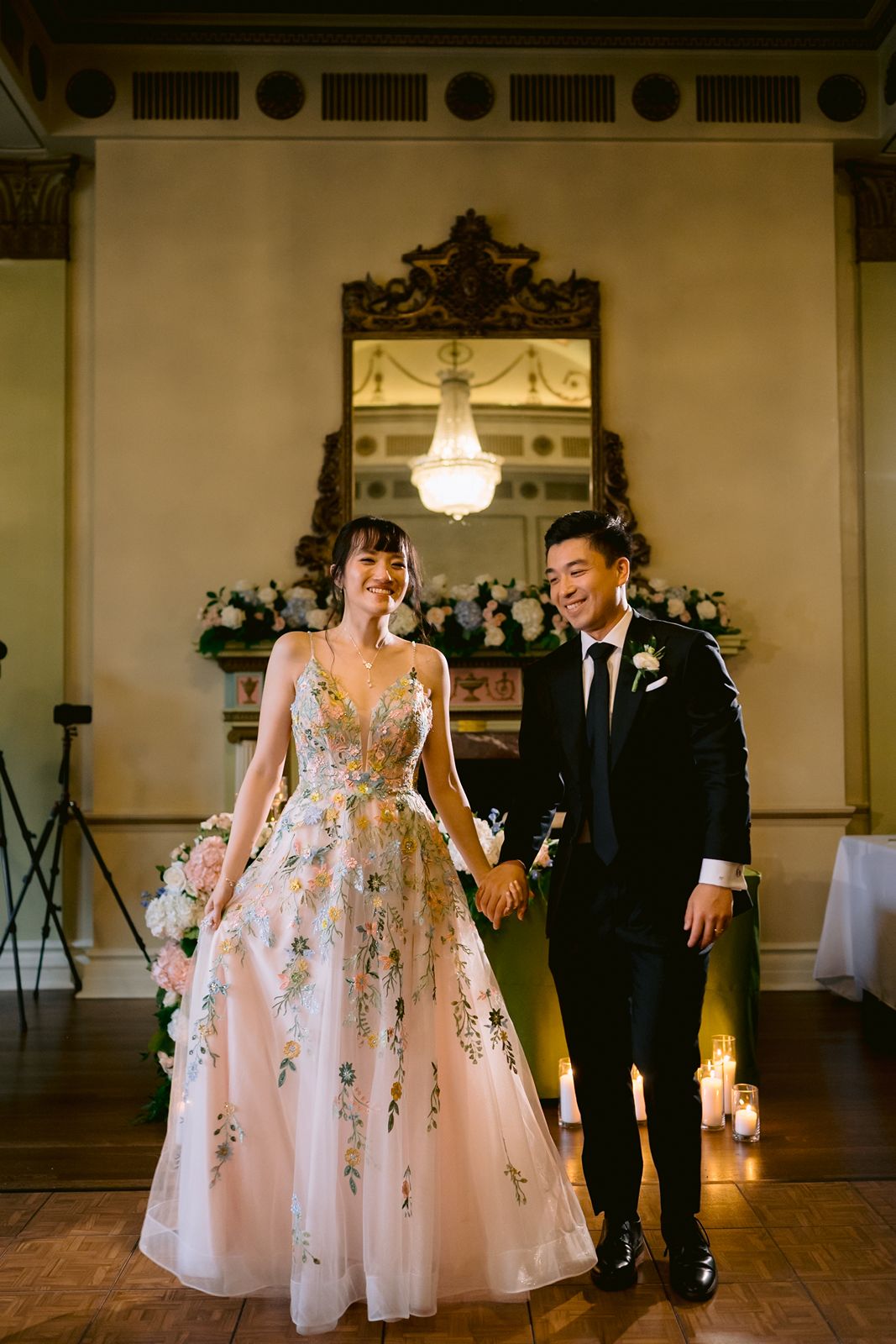 Floral patterned wedding dress for a whimsical reception look.